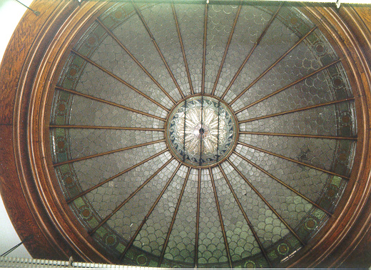 Stained-glass dome over original mahogany circulation desk, in Hazelwood Branch of The Carnegie Library of Pittsburgh